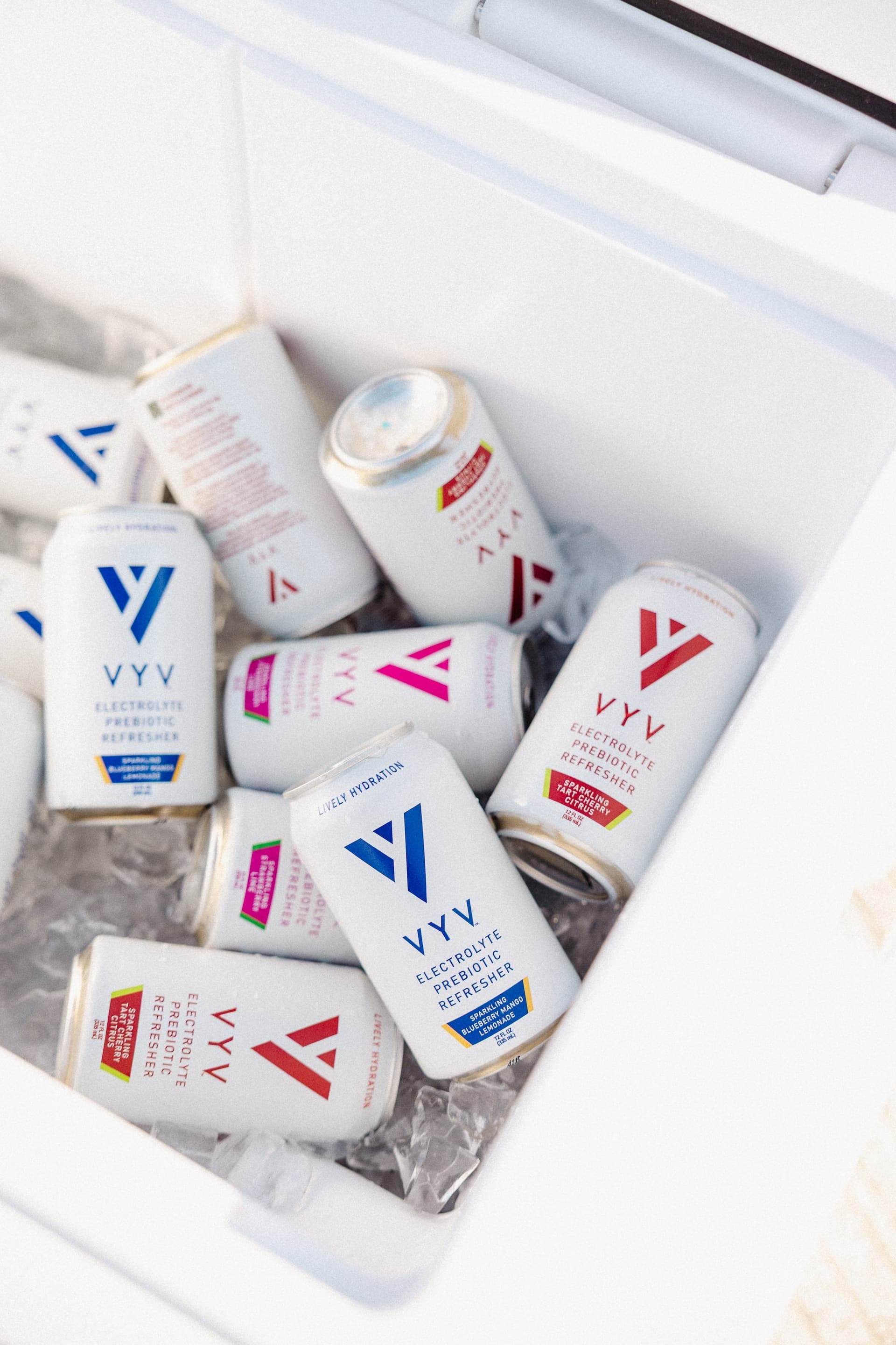 VYV Hydration cans on ice in a cooler